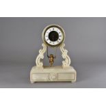 A marble mantle clock, the Roman ring dial AF and external escapement mechanism surmount a child