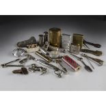 A collection of fold out pipe tools and lighters including one from the Campaign picnic Eisenhower