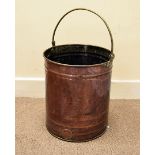 An early to mid-20th century copper tea urn, converted for use as a stick stand, with brass loop