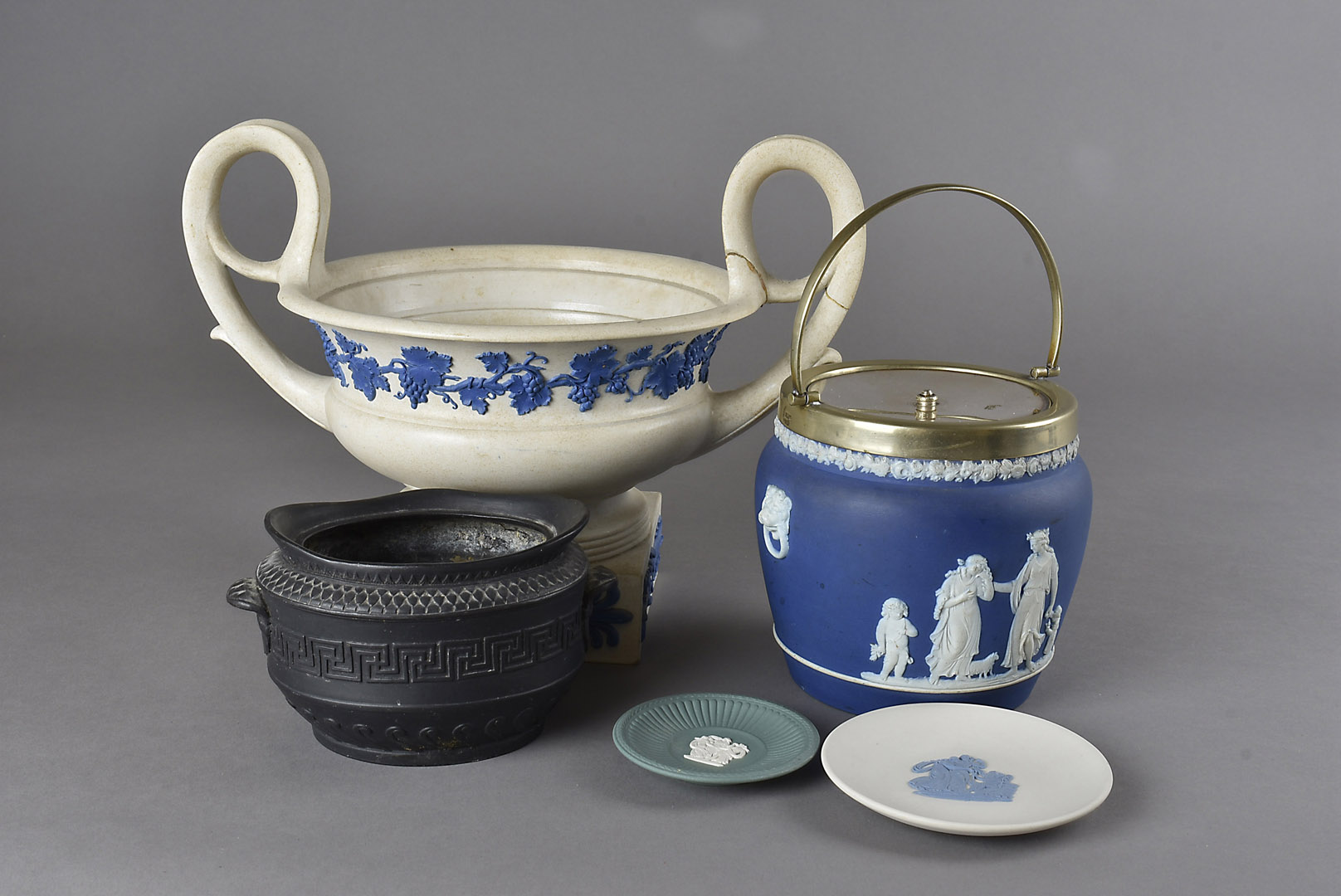 A collection of 19th Century and later Wedgwood pottery, including a neo classical style basalt twin