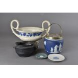 A collection of 19th Century and later Wedgwood pottery, including a neo classical style basalt twin