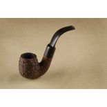 A Savinelli Punto Oro briar estate pipe, the rusticated bent shaped bowl and shank, stamped 614,