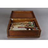 An artist's paint box, complete with paints and brushes, and including two Windsor & Newton