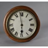 An Oak cased single fusee wall clock, circular face with white dial, Roman numerals, brass back