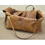 A large continental leather holdall, with chromed buckles and clasp 70 cm x 32 cm x 40 cm H