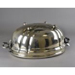 A large 19th century silver plated meat cover, of oval shape now converted to a large wine and