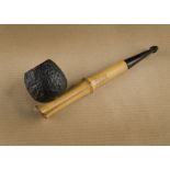 An interesting Highness Rustic London made pipe, the Algerian briar bowl on a Whangee bamboo stem,