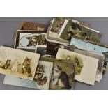 A collection of Edwardian and later postcards, all loose, to include two Louis Wain pussy cat