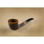 A Radice Rind briar estate pipe by Huber München, the curved design with sandblasted finish, the