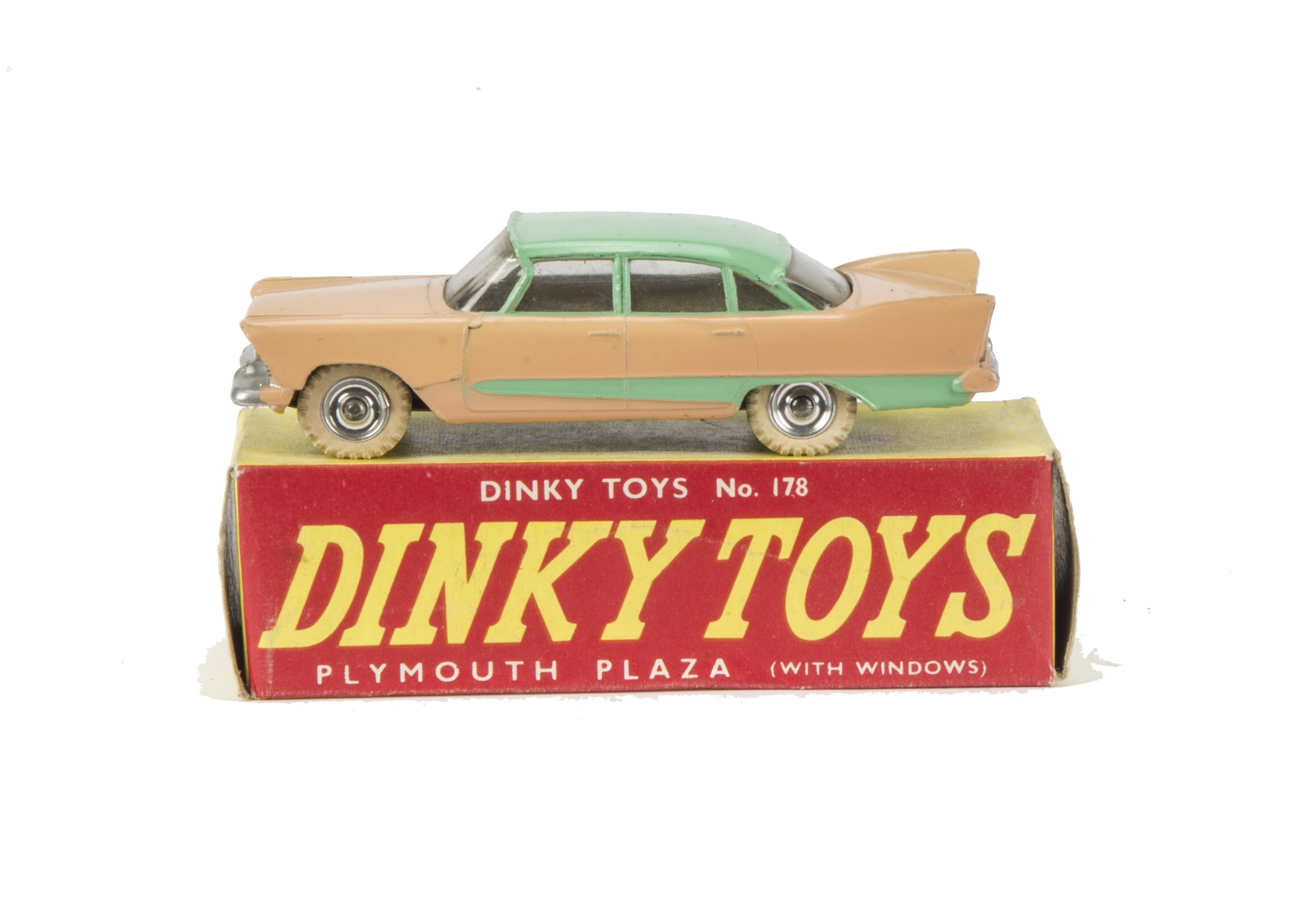 A Dinky Toys 178 Plymouth Plaza, salmon pink body, light green roof and side flash, spun hubs, in