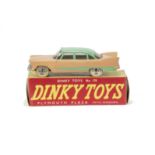 A Dinky Toys 178 Plymouth Plaza, salmon pink body, light green roof and side flash, spun hubs, in