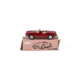 A Solido No.106 Alfa-Romeo Giulietta-Spider, dark red body, white interior, female driver figure,