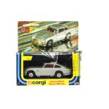 A Corgi Toys 271 James Bond Aston Martin, silver body, red interior, dish wheels, 1:36 scale