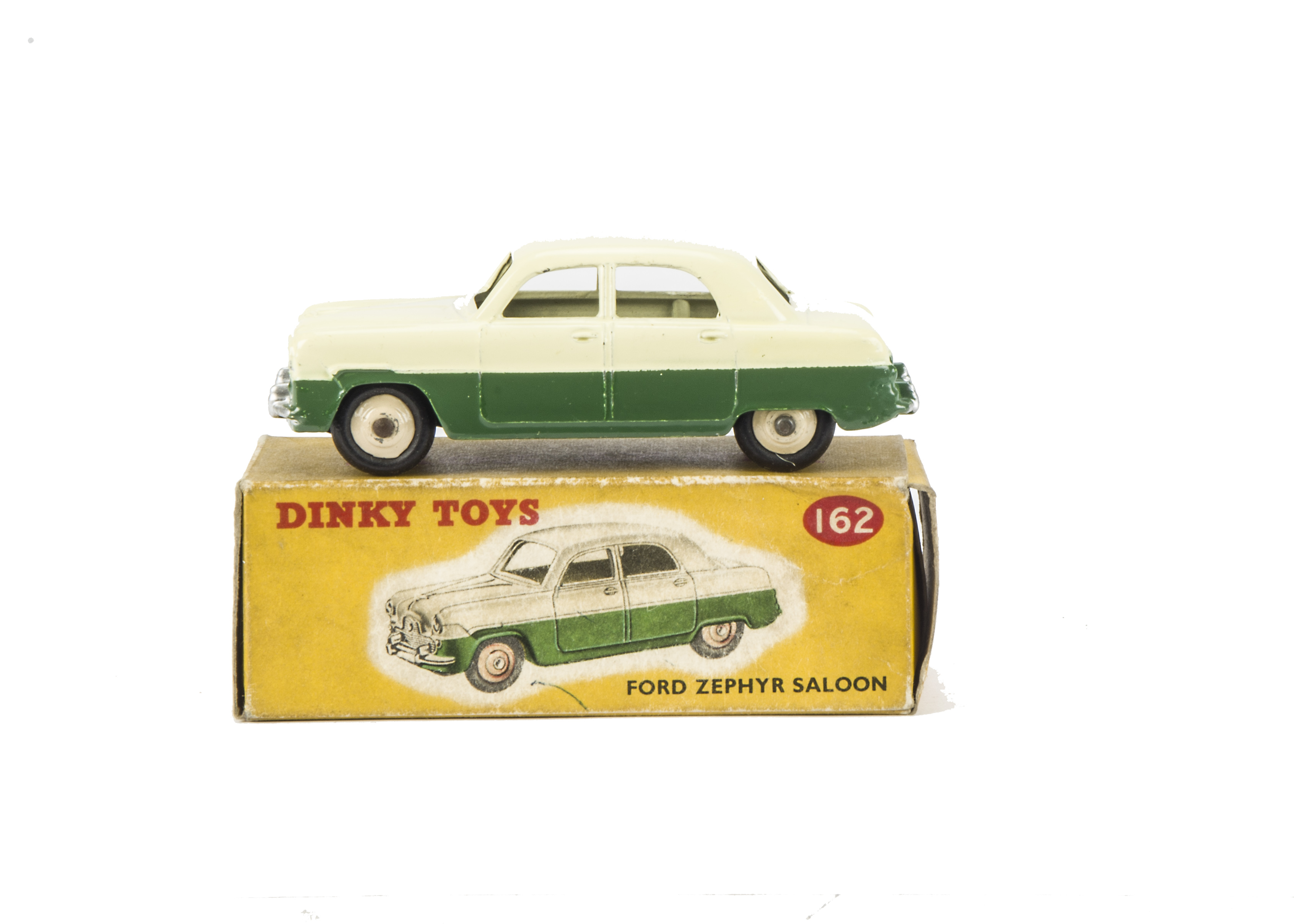 A Dinky Toys 162 Ford Zephyr Saloon, cream upper body, dark green lower, cream ridged hubs, in