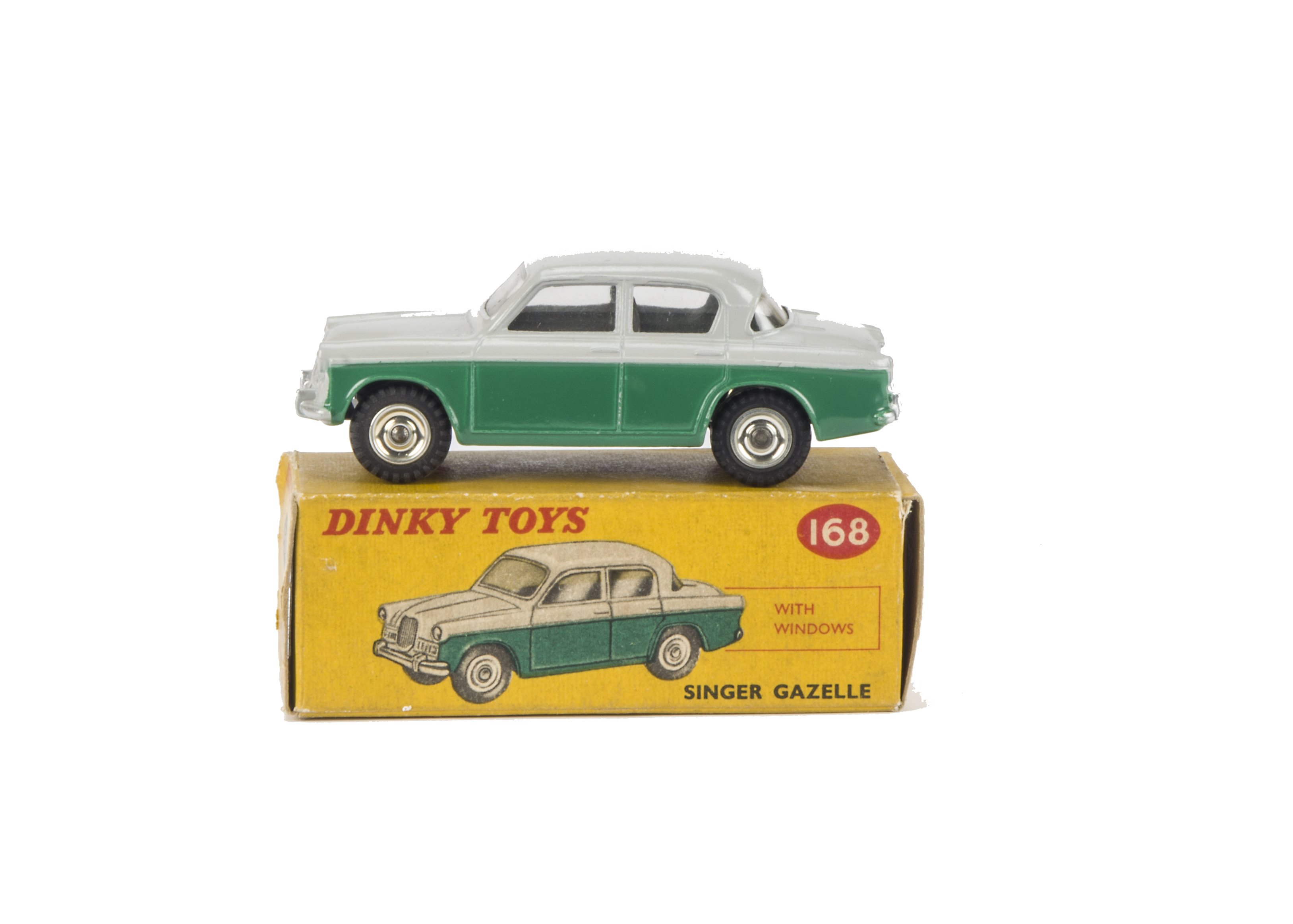 A Dinky Toys 168 Singer Gazelle, dark green lower body, grey upper, spun hubs, in original box, E,