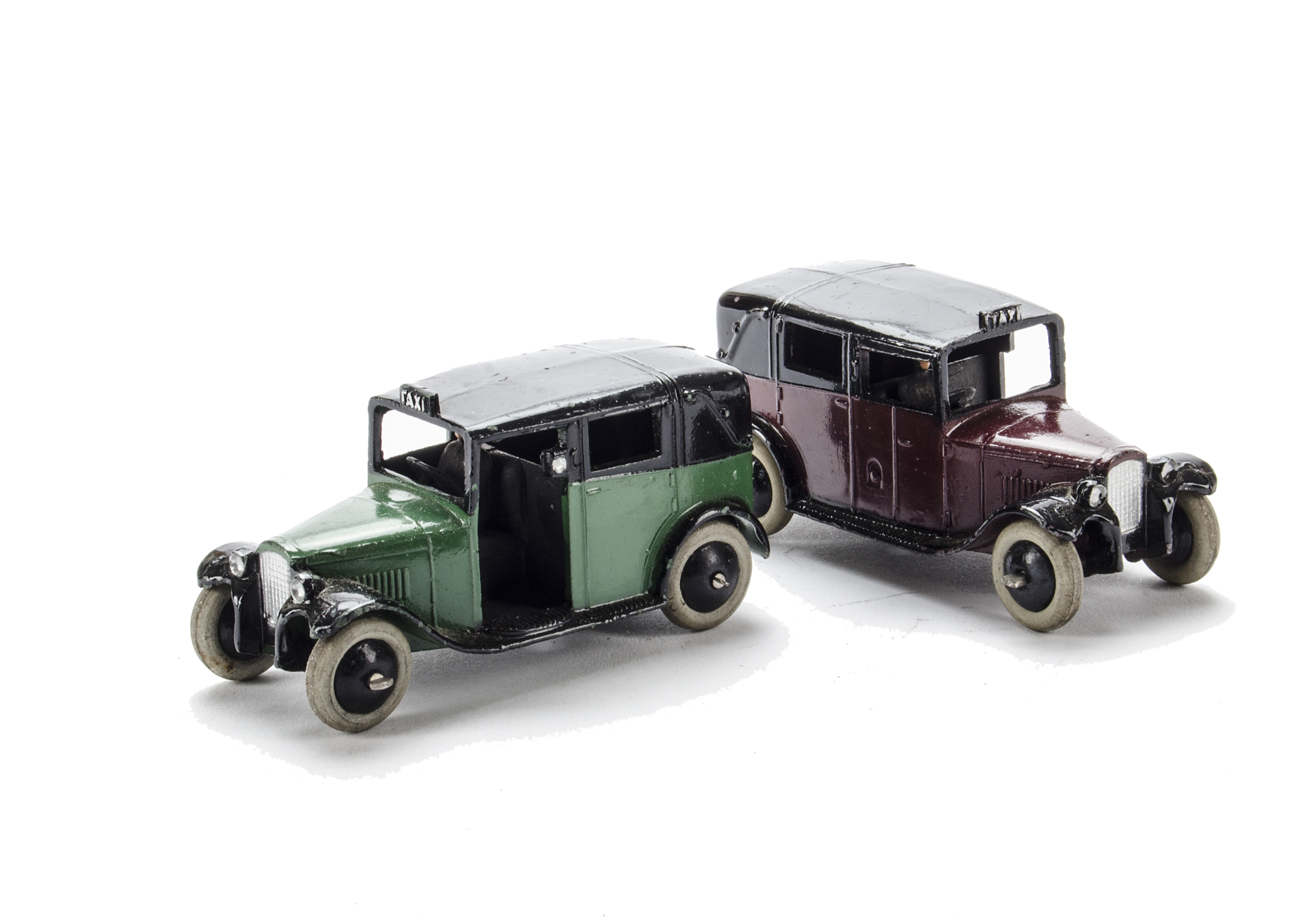 Early Post-War Dinky Toys 36g Taxi with Driver, green body, black roof, open rear window, black