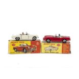 A Dinky Toys 113 M.G.B Sports Car, cream body, red interior, grey plastic driver, spun hubs, 114