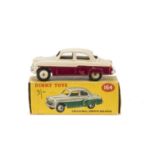 A Dinky Toys 164 Vauxhall Cresta Saloon, maroon lower body, light beige upper body and hubs, in