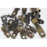 Large collection of Minic Motorway Spares, including various chassis, eight with motors, eighteen