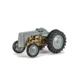 A Chad Valley Large Ferguson Tractor, originally green but repainted grey and gold, without three-