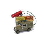 A Marx Toys Remote Control Land Rover, battery operated in dark green with black bumper, silver trim