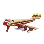A Joustra France tin Croix du Sud Air France clockwork and electric Airplane, in cream and red