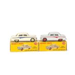 Dinky Toys 176 Austin A105 Saloon, two examples, first cream body, blue flash, cream hubs, second