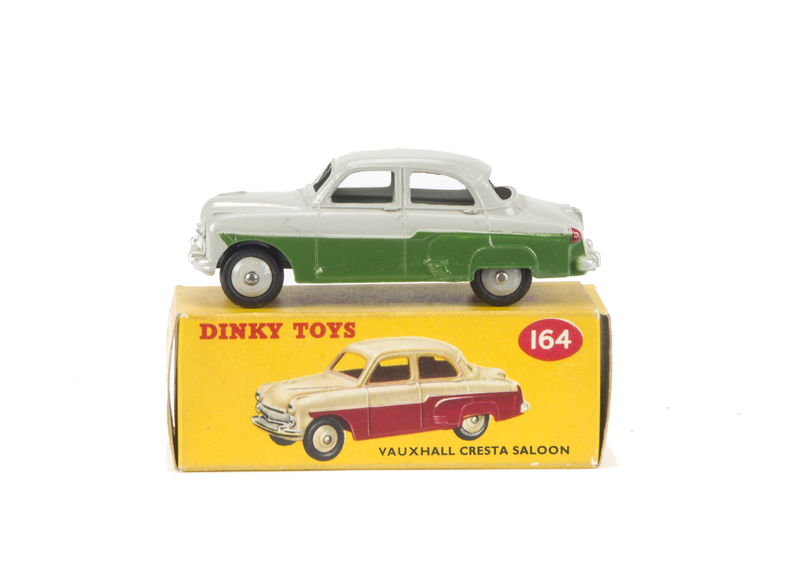 A Dinky Toys 164 Vauxhall Cresta Saloon, green lower body, grey upper body and hubs, in original