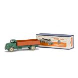 A Dinky Toys 532 Comet Wagon With Hinged Tailboard, dark green cab and chassis, orange back, cream