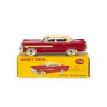 A Dinky Toys 174 Hudson Hornet Sedan, red lower body, cream roof and side flashes, spun hubs, in