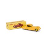 A Dinky Toys 157 Jaguar XK120 Coupe, yellow body, light yellow hubs, in original box, VG, box G