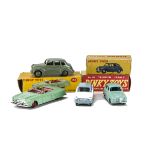 A Dinky Toys 189 Triumph Herald, light blue/white body, spun hubs, VG, 132 Packard Convertible,
