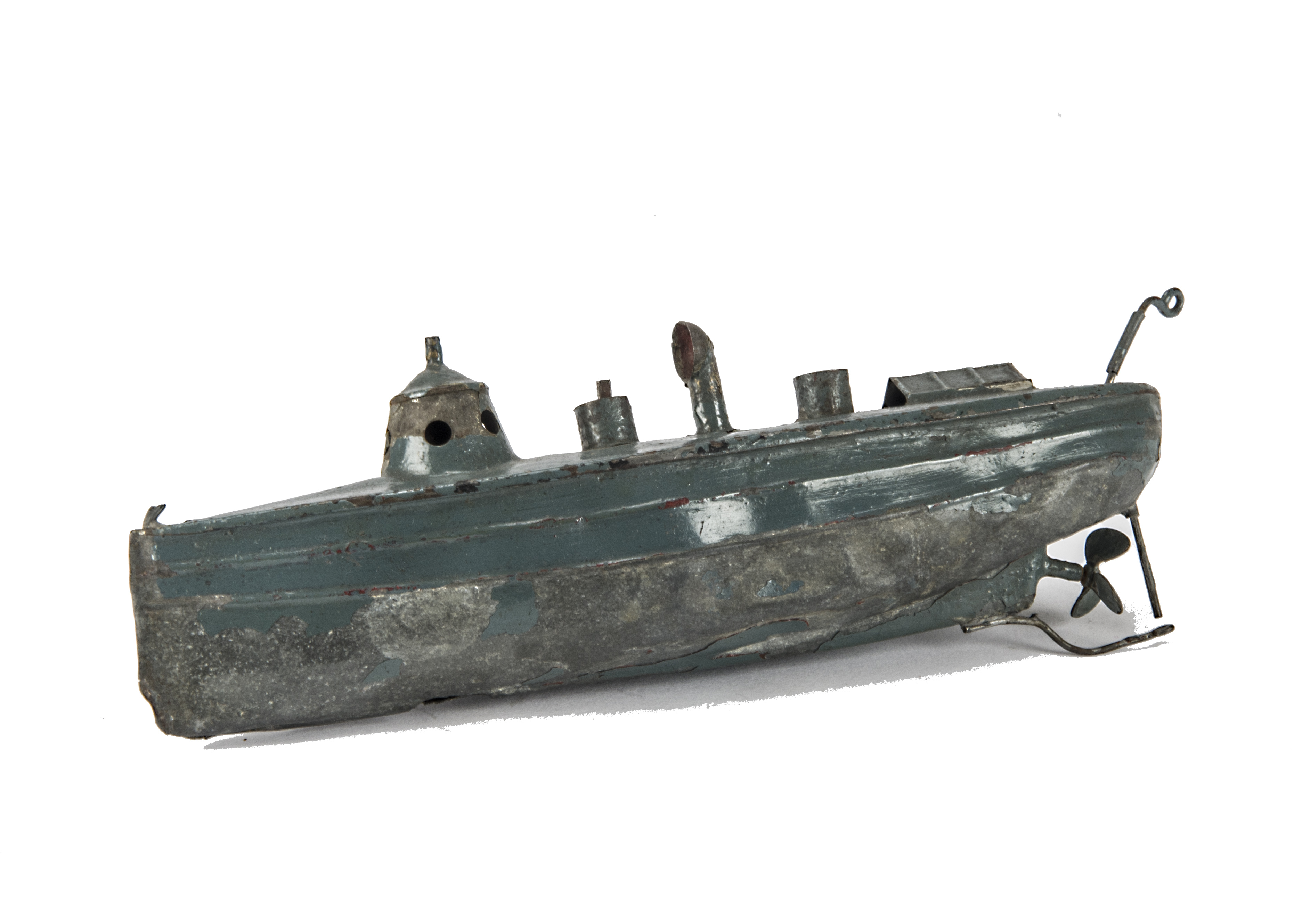 A Carette 200mm clockwork Battleship, in deep sea blue,P- F, general paint loss, clockwork motor
