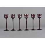 A set of six 19th Century long stemmed liquor glasses, flashed cranberry bodies with engraved