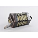 An Edwardian hexagonal shaped squeezebox, with rosewood fret carved ends, bone buttons, paper and