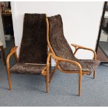 A pair of Swedese easy chairs, having removable shagpile upholstery to bentwood frame, stamped to