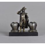 A Victorian figural table lighter, the central spelter gent standing in military dress smoking