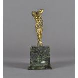 A Victorian silver gilt figural statue, on marble base, of a Bacchus female with vine leaves and