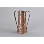A Newlyn arts and crafts copper twin handled vase, of tapering design with loop strap handles, the