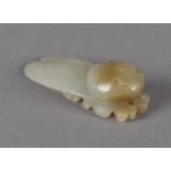 A 19th Century Chinese mutton fat jade carved cicada, the abdomen with bulbous head and pierced hole