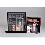 A Jean Paul Gaultier Christmas Madame shop display, the back with Gaultier script and stylised