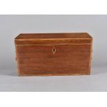 A Regency walnut veneered cross banded sarcophagus shaped tea caddy, with satin stringing, lion mask