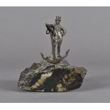 A 19th Century bronzed metal and black marble paperweight, modelled as a gentleman sailor standing