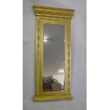 A modern gilt hall mirror, of rectangular form in the classical style with bevelled glass, stepped