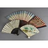 A collection of 19th and 20th Century Japanese fans, mostly in wood, some bone, with various