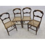 Four William IV mahogany balloon back single chairs, with caned seats and turned supports (4)