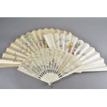 A group of three Victorian and Edwardian bone fans, two with silk leaves having painted designs, and