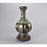 A 19th Century Chinese segmented cloisonné vase, the copper base with all over decoration of five