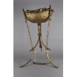 A continental gilt metal plant stand, in simulated bamboo and basket ware, 77 cm high x 41 cm