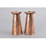 A pair of Newlyn copper arts and crafts vases, of tapering design with flared crimped rims,